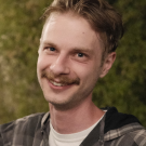 person in plaid shirt