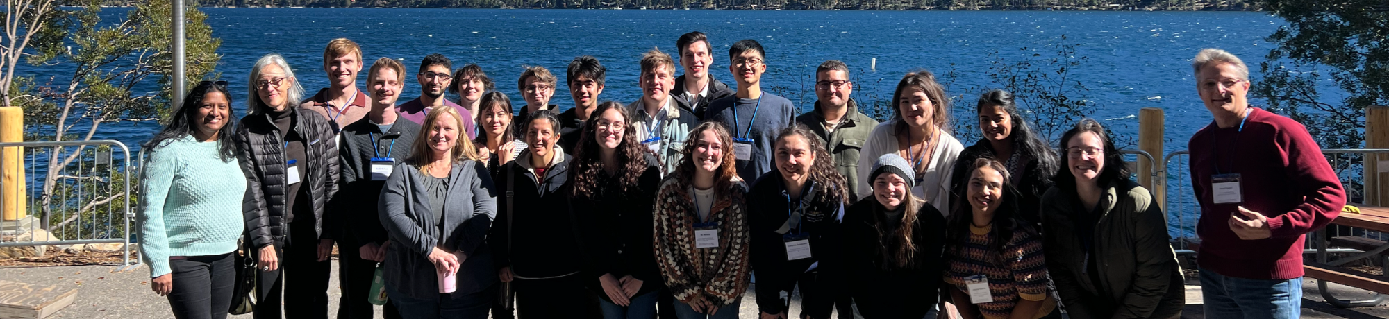 picture of group with lake in background